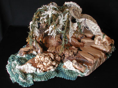 Another view of the veiled cave and gnarled topography