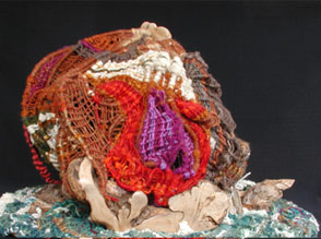 bright purple and red doors/shutters to close off Circe's raised round bed chamber/swinging bed.