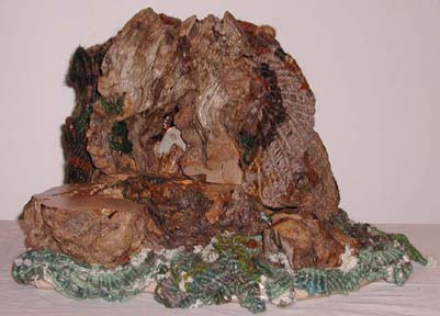 Cyclops Cave, wood, yarn, stone